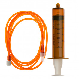 Flat top catheter tip irrigation syringe