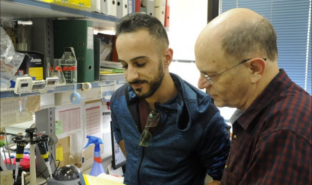 Dr. Yossi Shiloh, right, is a professor of human genetics at Tel Aviv University.